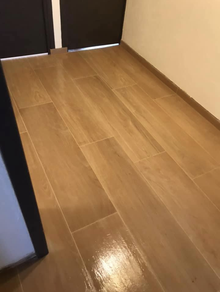 HED Construction - Réalisation pose d'un carrelage effet parquet chêne